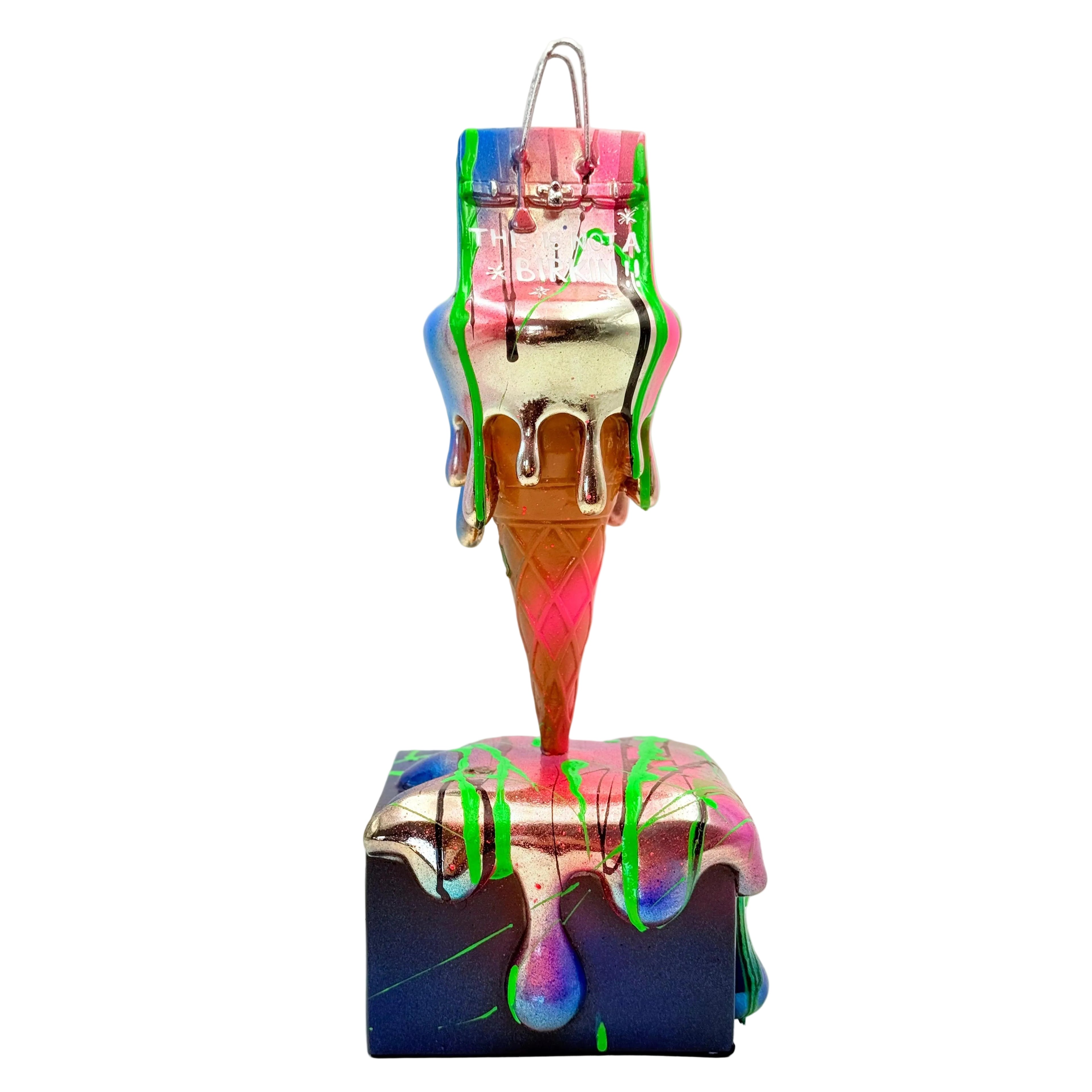 silver melty bag sculpture with dripping chrome design